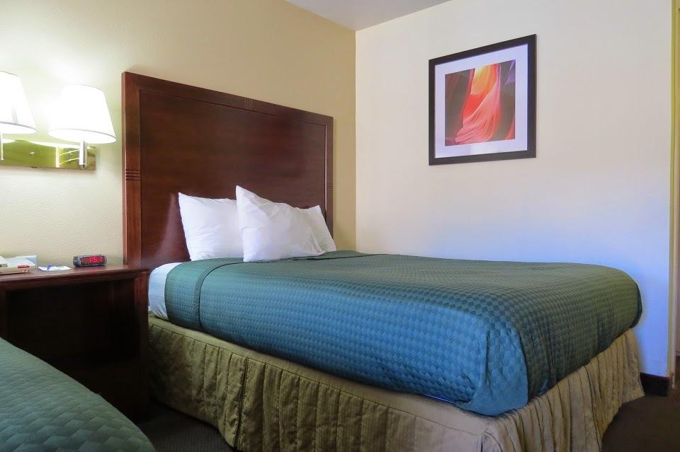 Hotel guest room with king bed
